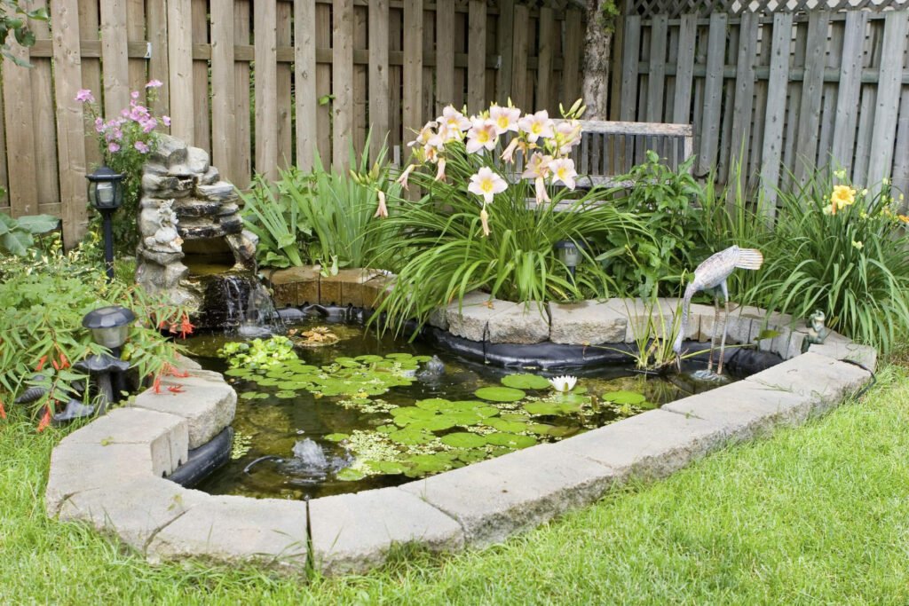 40 Small Garden Design Ideas: Genius Tips for Tiny Spaces garden with pond 1024x683 - 40 Small Garden Design Ideas: Genius Tips for Tiny Spaces